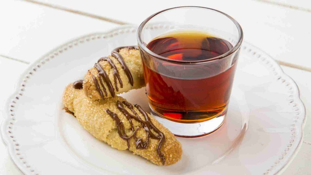 glass of Marsala wine with sweets